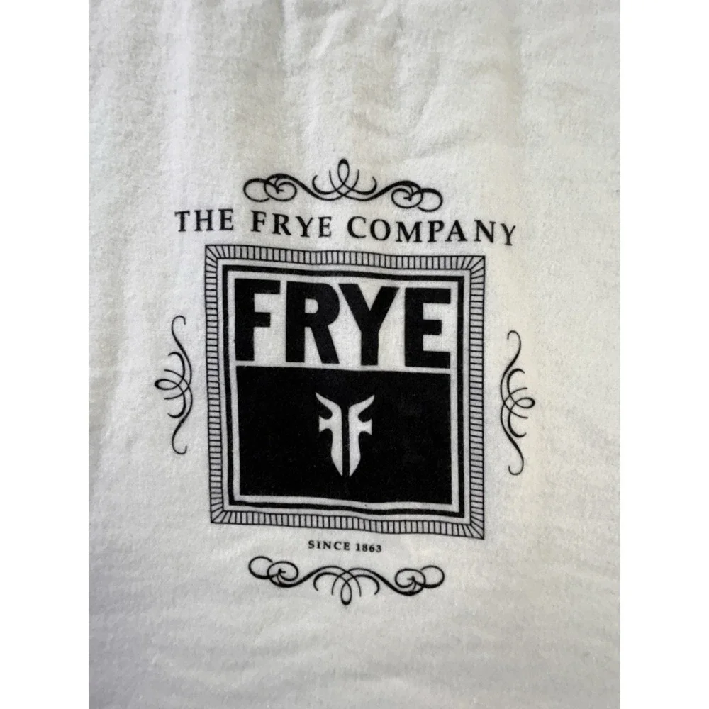 The Frye‎ Company cream-colored cotton dust bag with a drawstring closure boots